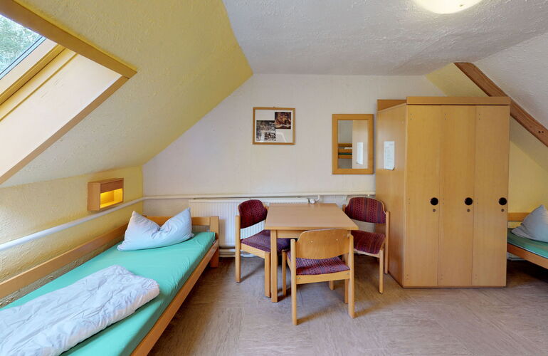 Zimmer mit Einzelbetten im Waldhof Finsterbergen